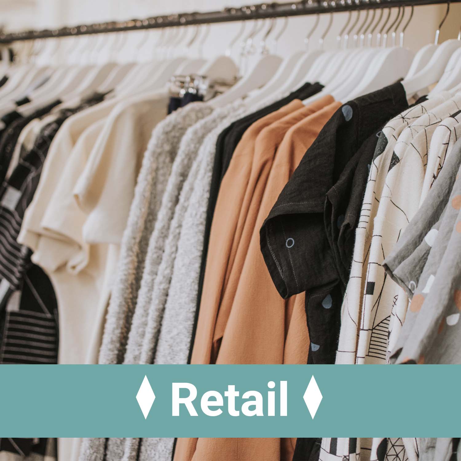 A fully stocked clothing rack with the text, retail