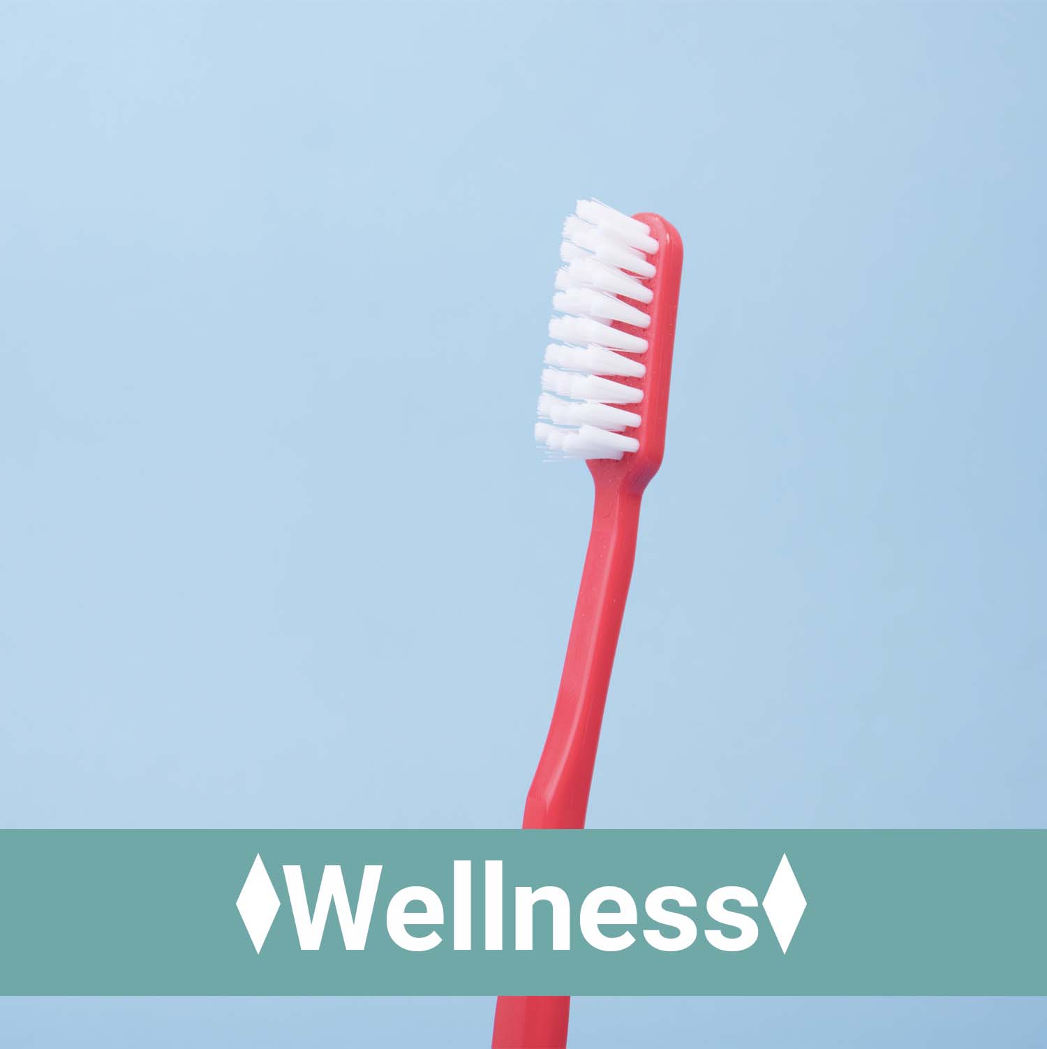 a toothbrush with the text, wellness